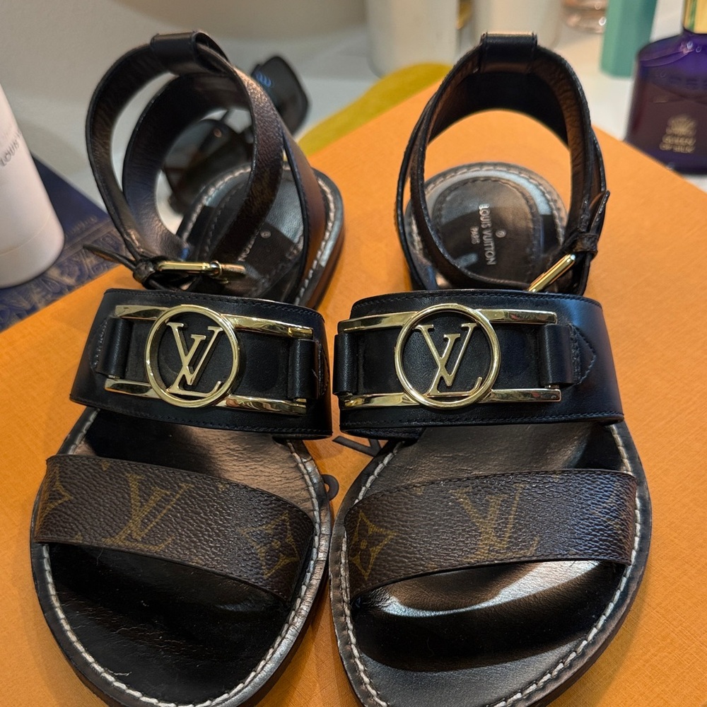 Louis Vuitton Black Sandals with Gold Logo